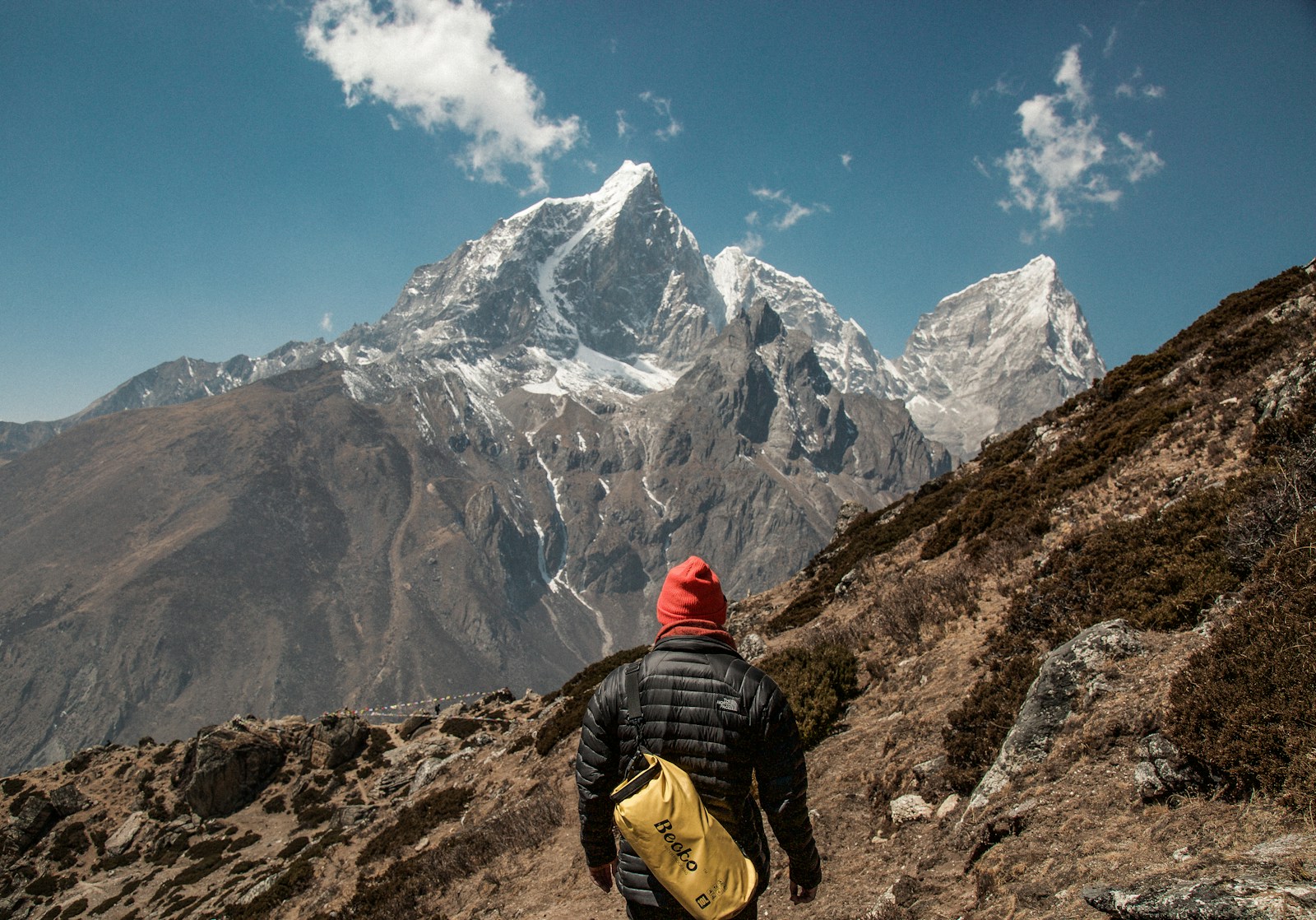 person standing in front of the next mountain